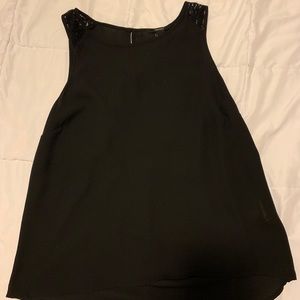 Black blouse with lace on shoulder straps